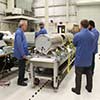 Payload team finishing assembly.